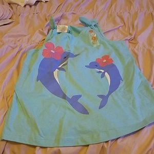 A blue dolphin shirt